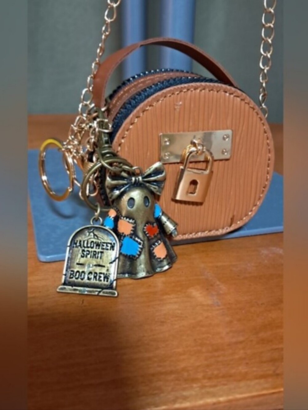 Brown Round Crossbody Bag with Charm Halloween Feel.. 3 By 3 Inch